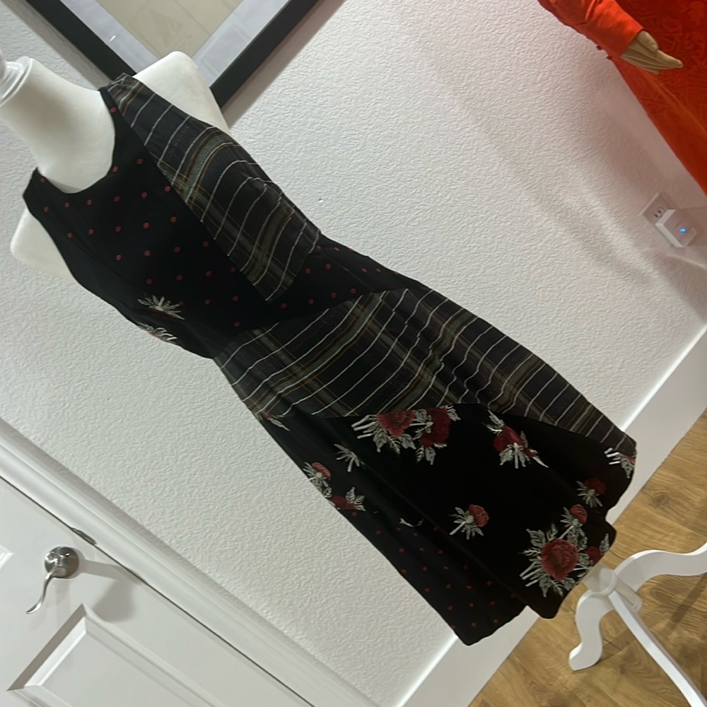 Pretty Anthro black dress.